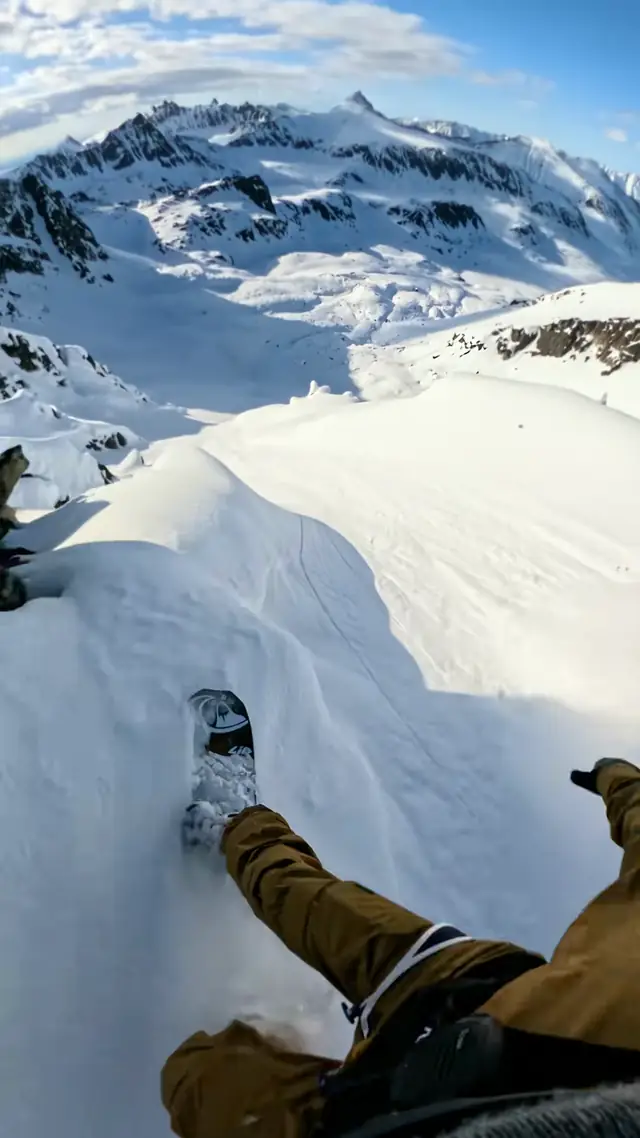 the smoothest drop in 👏 🏂: Travis Rice #redbull #givesyouwiiings #ene...