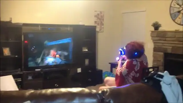 Gaming Grandma Completely Freaks Out When VR Zombies Appear On Screen