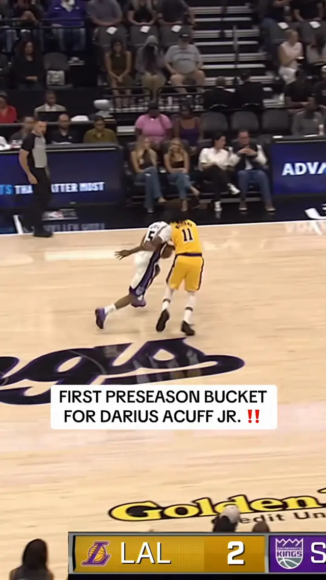 Darius Acuff Jr. shows off the handles before scoring his first point...