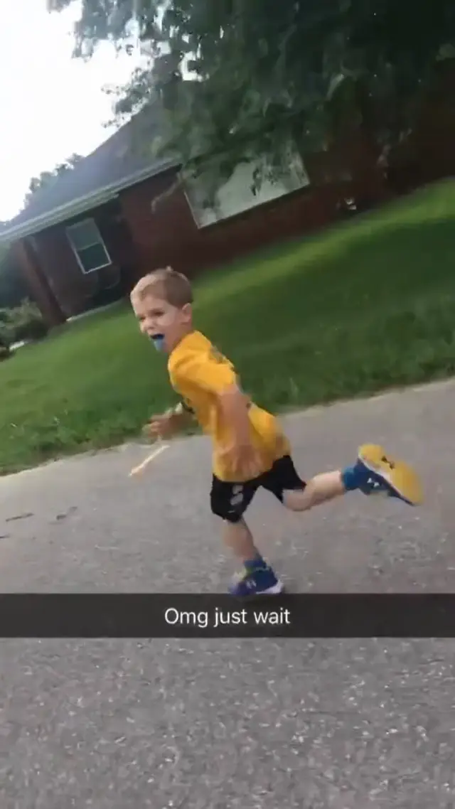 Kid Runs Right Into Parked Car
